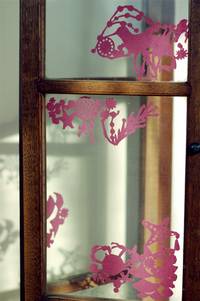 Paper-cutting seal. silk paper. road side. rose Paper-cutting seal. silk paper. road side. rose