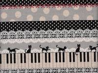 Katze & Klavier schwarz